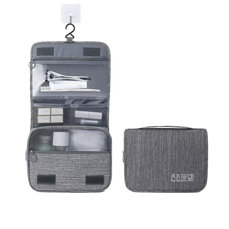 Large capacity gray hanging toiletry bag organizer shown open with hook and multiple compartments including clear PVC pocket and wet dry separation, with closed view beside it on white background